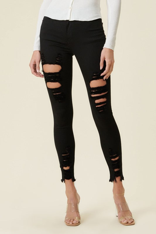 High Rise Distressed Skinny Jeans with a Raw Hem - Premium Jeans from Vibrant M.i.U - Just $57! Shop now at Ida Louise Boutique