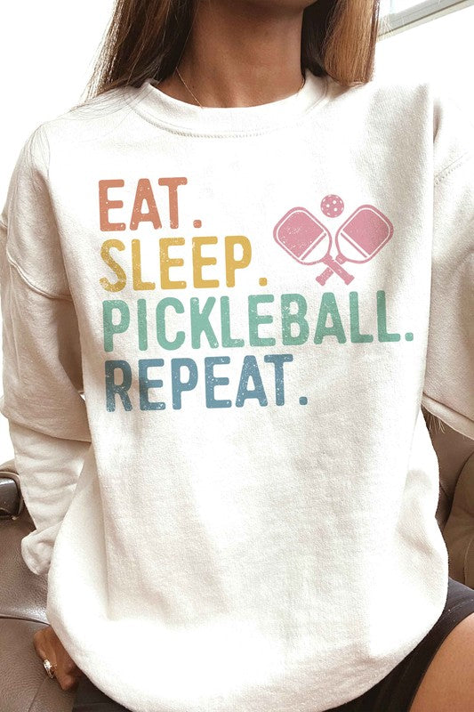 EAT. SLEEP. PICKLEBALL. REPEAT. GRAPHIC SWEATSHIRT - Premium Sweatshirt from BLUME AND CO. - Just $53! Shop now at Ida Louise Boutique