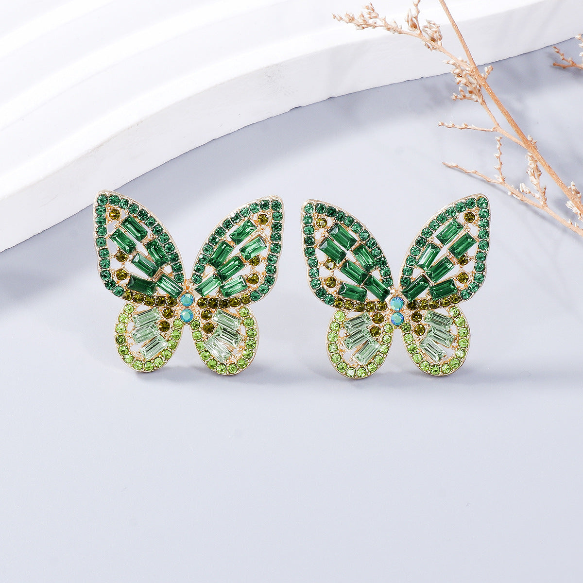 Alloy Inlaid Rhinestone Butterfly Earrings - Premium Earrings from Trendsi - Just $11! Shop now at Ida Louise Boutique
