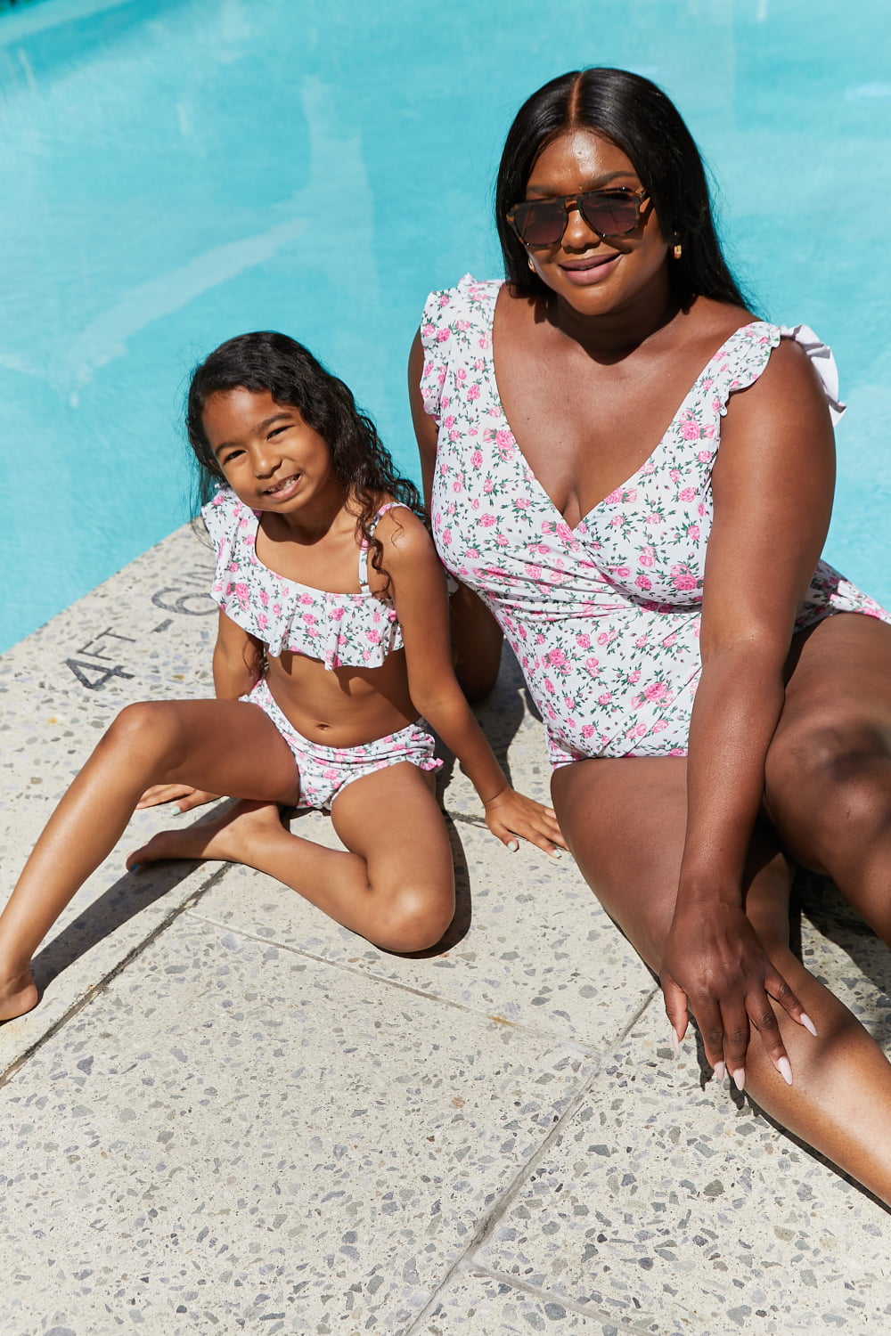 Marina West Swim Float On Ruffle Two-Piece Swim Set in Roses Off-White - Premium swim from Trendsi - Just $37! Shop now at Ida Louise Boutique