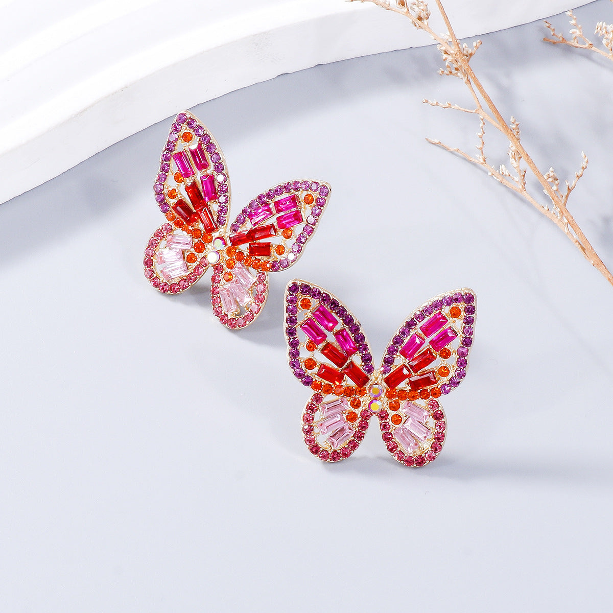 Alloy Inlaid Rhinestone Butterfly Earrings - Premium Earrings from Trendsi - Just $11! Shop now at Ida Louise Boutique