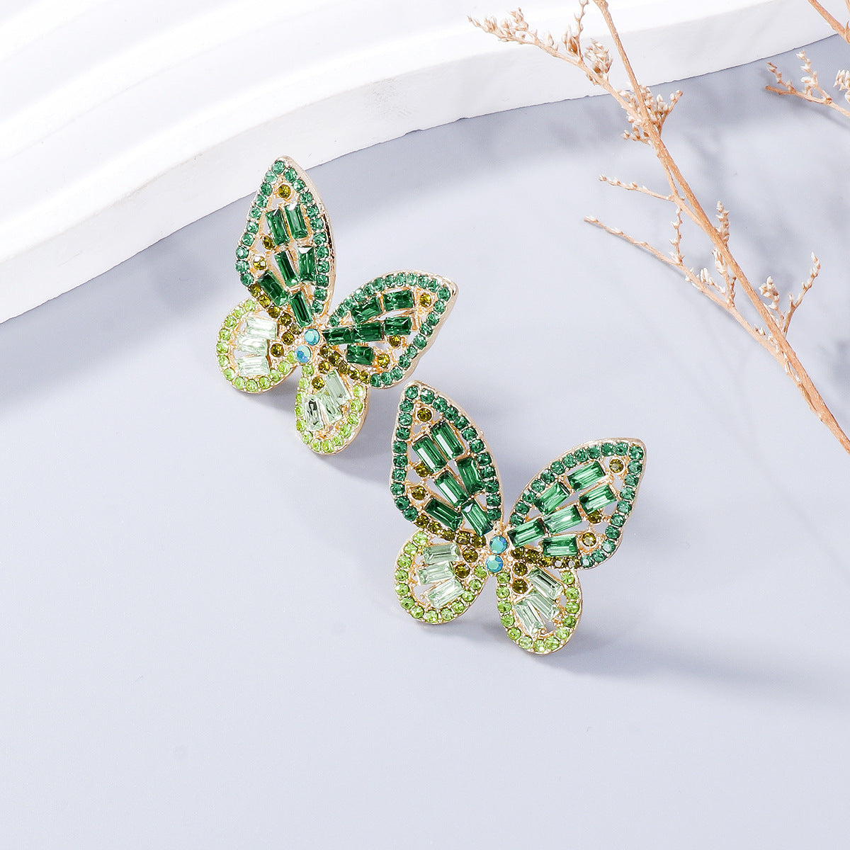 Alloy Inlaid Rhinestone Butterfly Earrings - Premium Earrings from Trendsi - Just $11! Shop now at Ida Louise Boutique