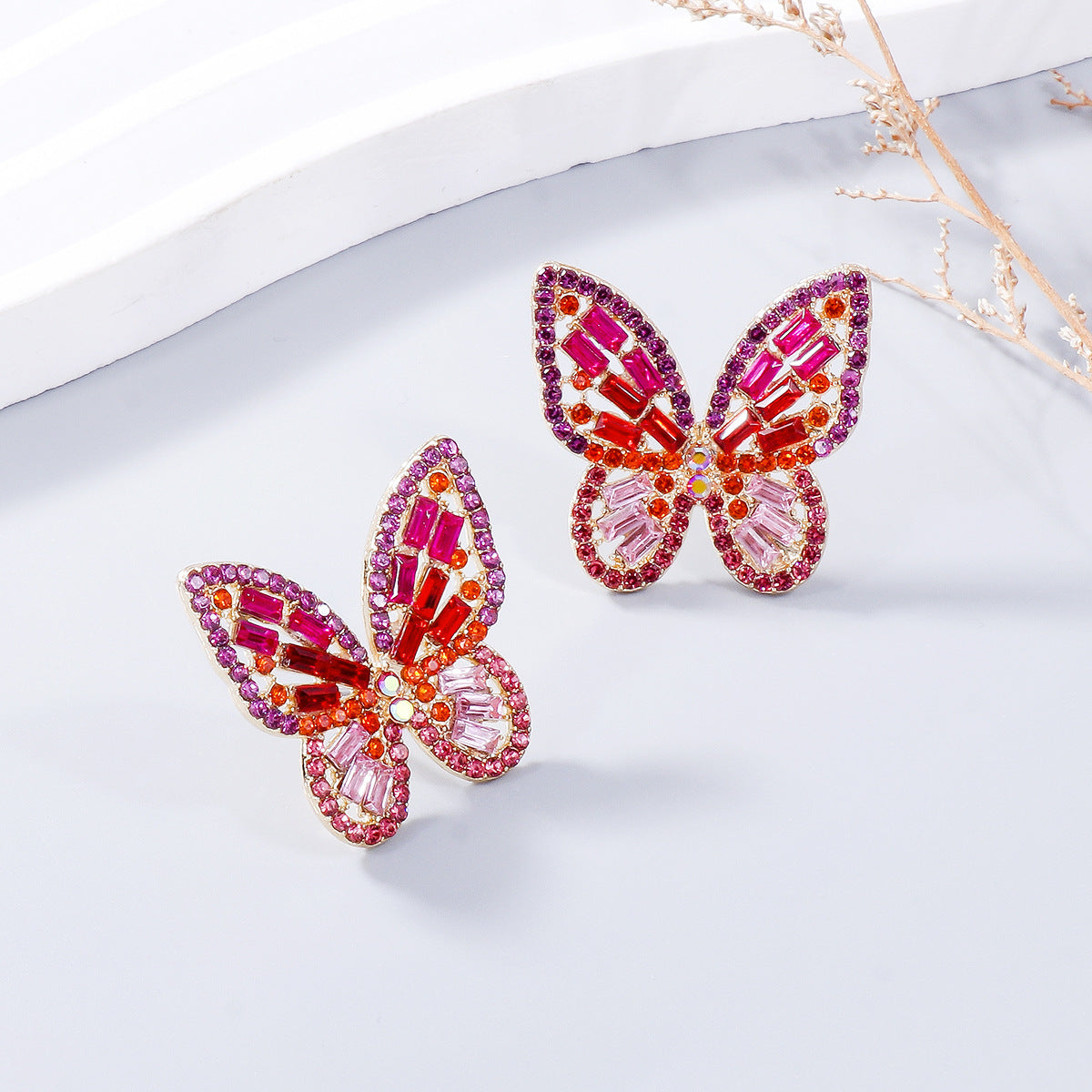 Alloy Inlaid Rhinestone Butterfly Earrings - Premium Earrings from Trendsi - Just $11! Shop now at Ida Louise Boutique