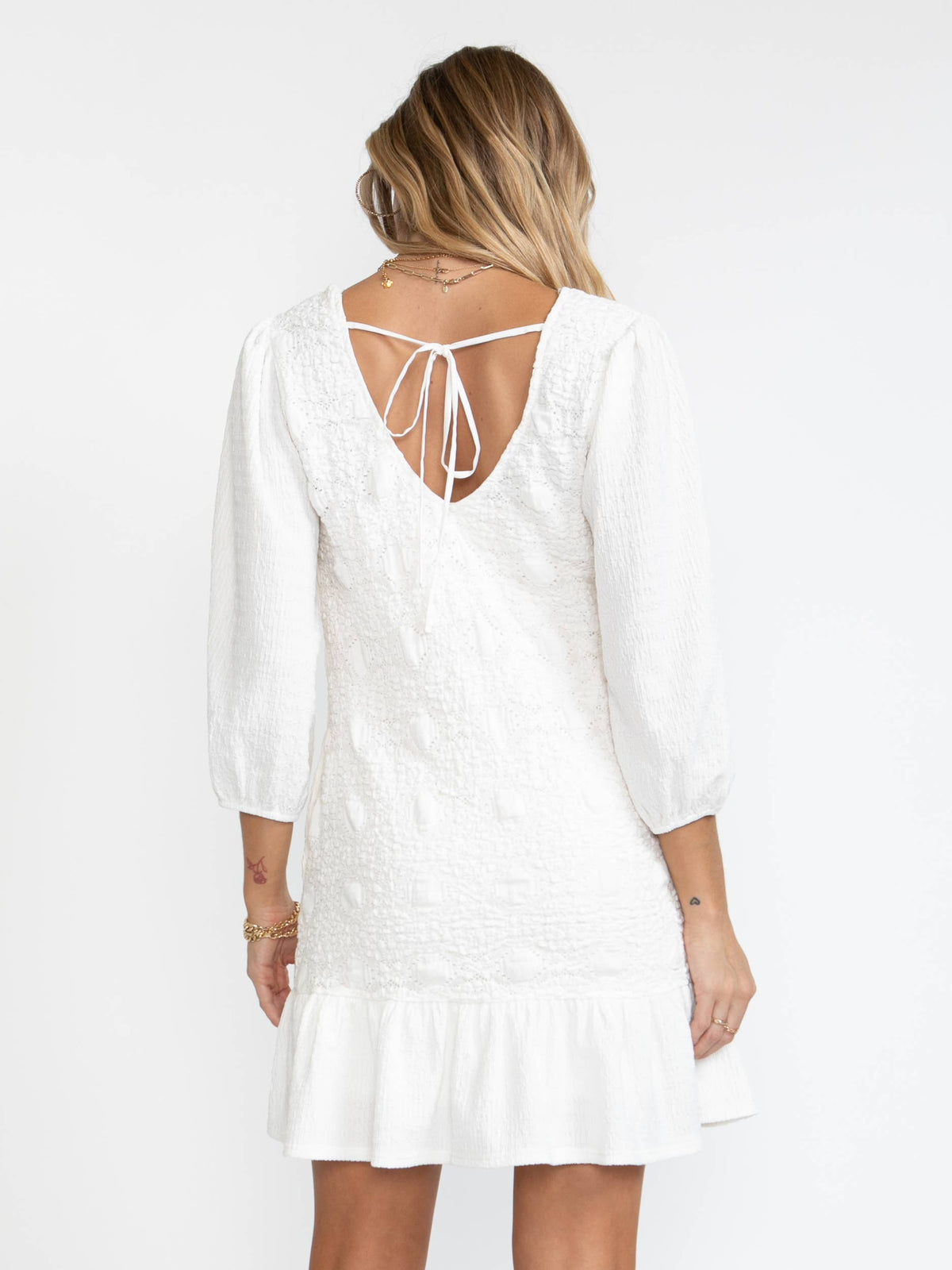 Textured White Hollow Fabric 3/4 Sleeve Mini Dress & Tie Back - Premium Dresses from GPD label - Just $62! Shop now at Ida Louise Boutique