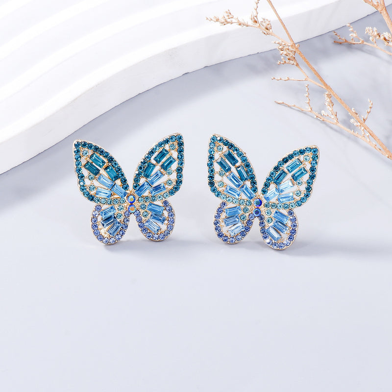 Alloy Inlaid Rhinestone Butterfly Earrings - Premium Earrings from Trendsi - Just $11! Shop now at Ida Louise Boutique