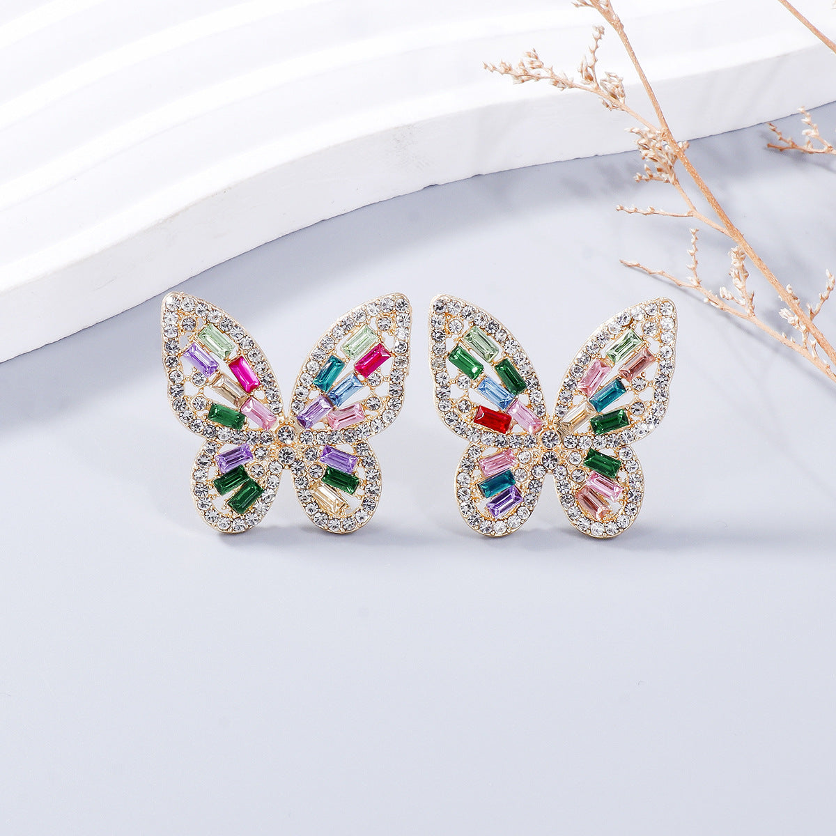 Alloy Inlaid Rhinestone Butterfly Earrings - Premium Earrings from Trendsi - Just $11! Shop now at Ida Louise Boutique