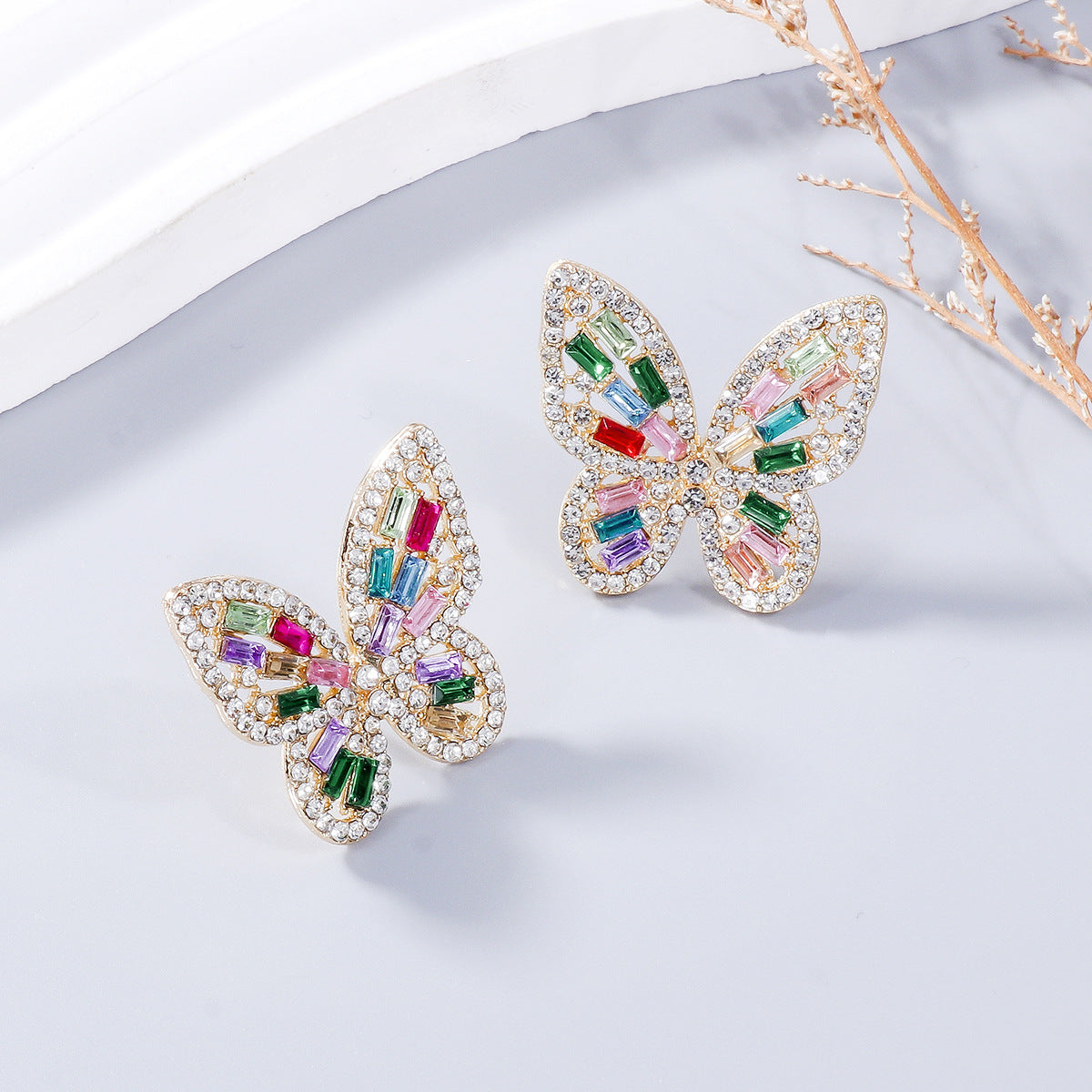 Alloy Inlaid Rhinestone Butterfly Earrings - Premium Earrings from Trendsi - Just $11! Shop now at Ida Louise Boutique