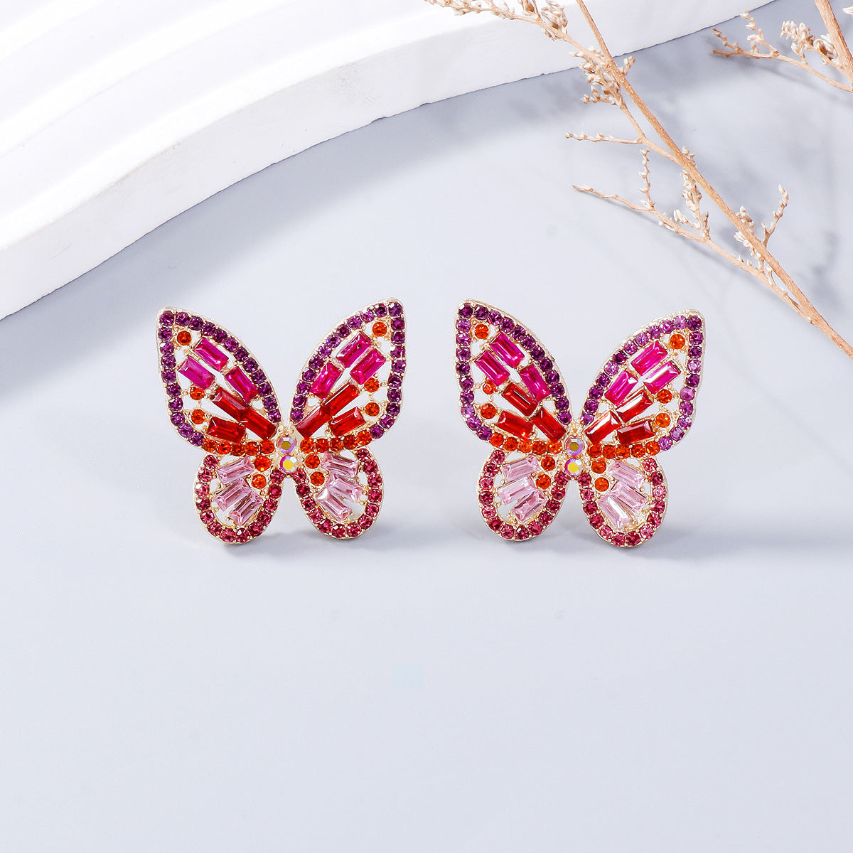 Alloy Inlaid Rhinestone Butterfly Earrings - Premium Earrings from Trendsi - Just $11! Shop now at Ida Louise Boutique