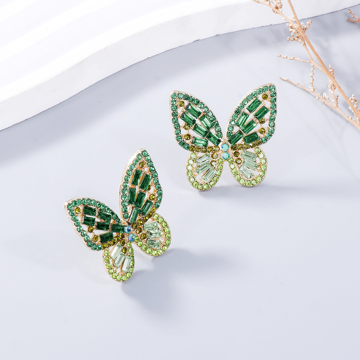 Alloy Inlaid Rhinestone Butterfly Earrings - Premium Earrings from Trendsi - Just $11! Shop now at Ida Louise Boutique