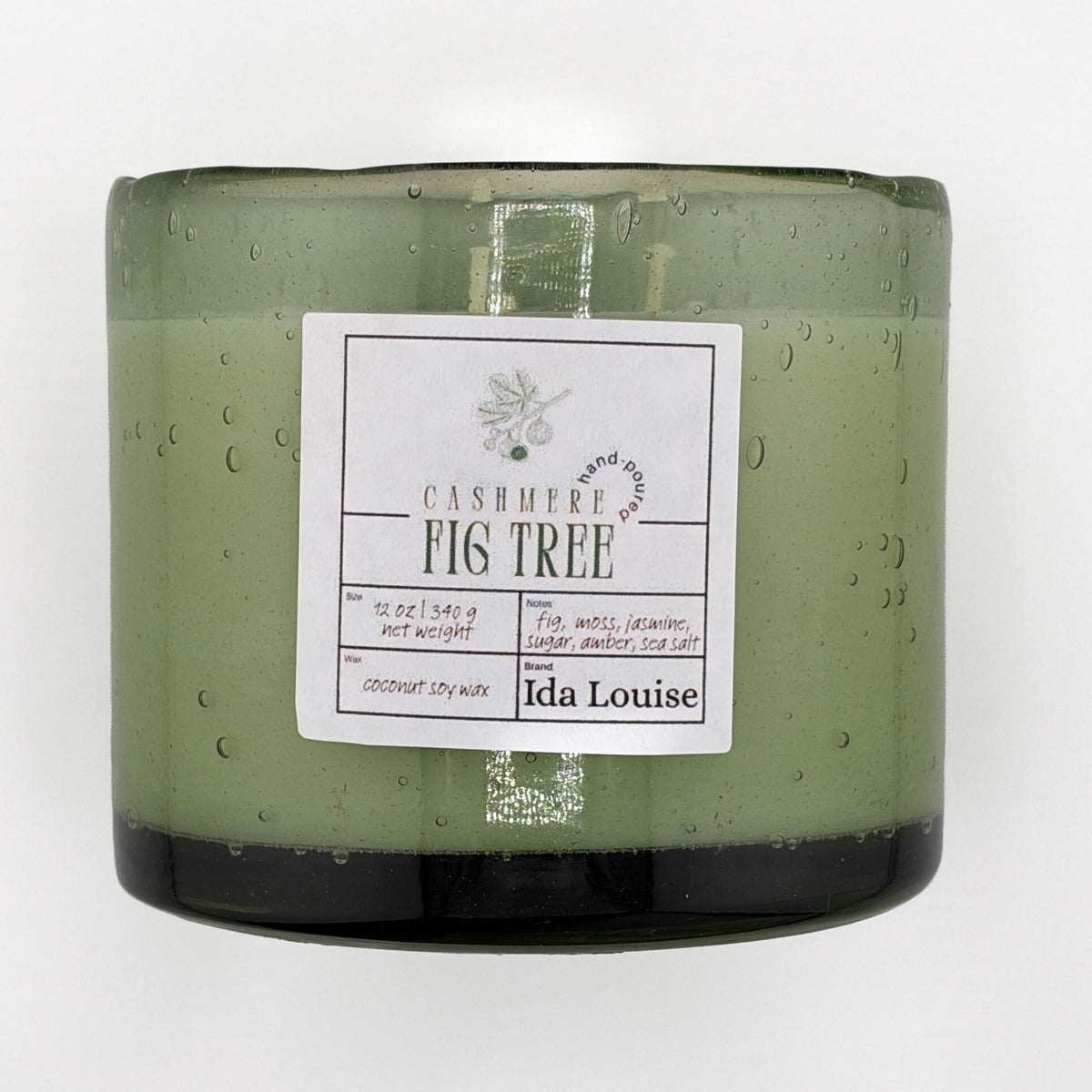 Ida Louise Cashmere Fig Tree candle, 12 oz coconut soy wax in a green bubble-glass jar