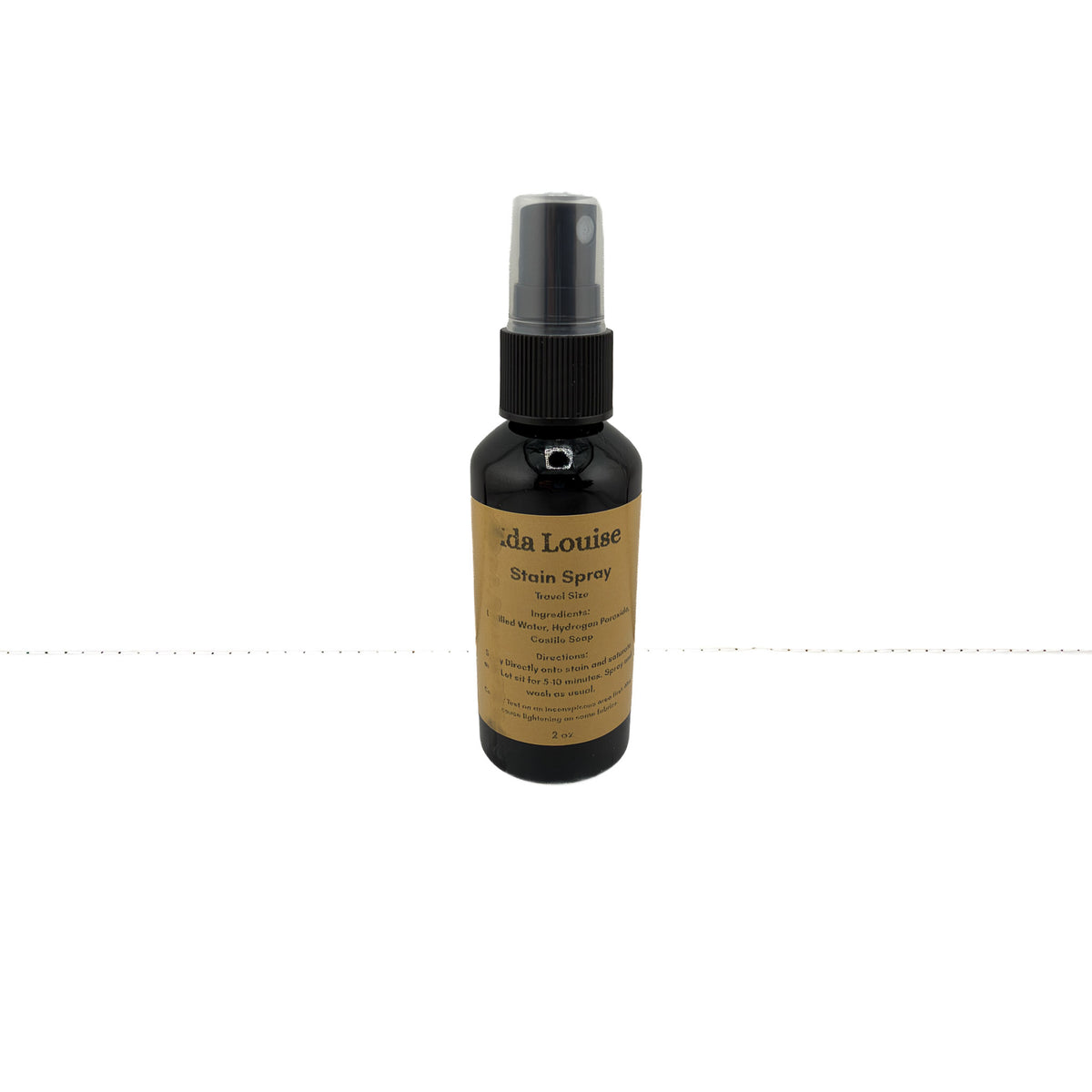 Ida Louise Stain Spray, 2 oz travel-size amber spray bottle