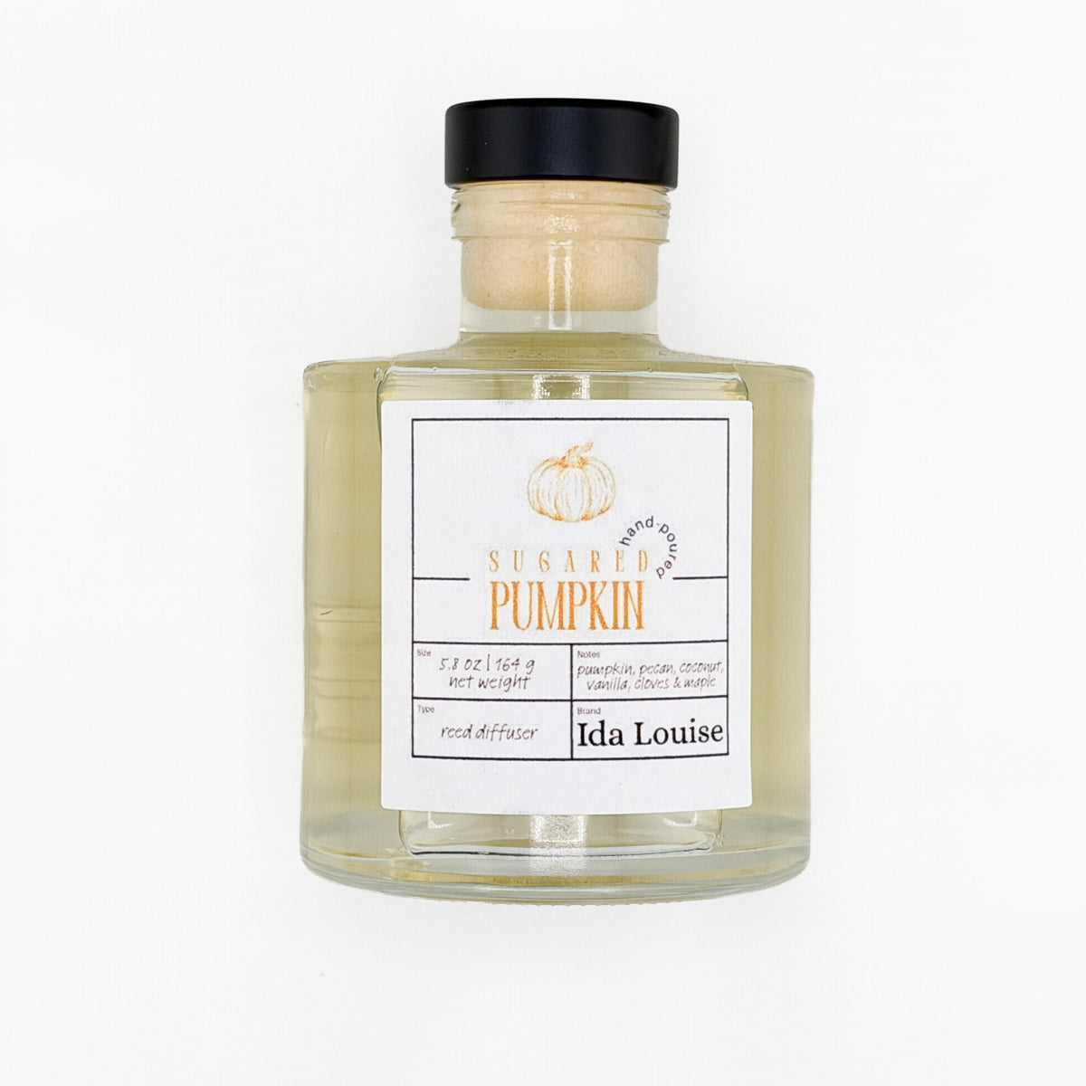 Ida Louise Sugared Pumpkin reed diffuser, 5.8 oz glass bottle with a black cap