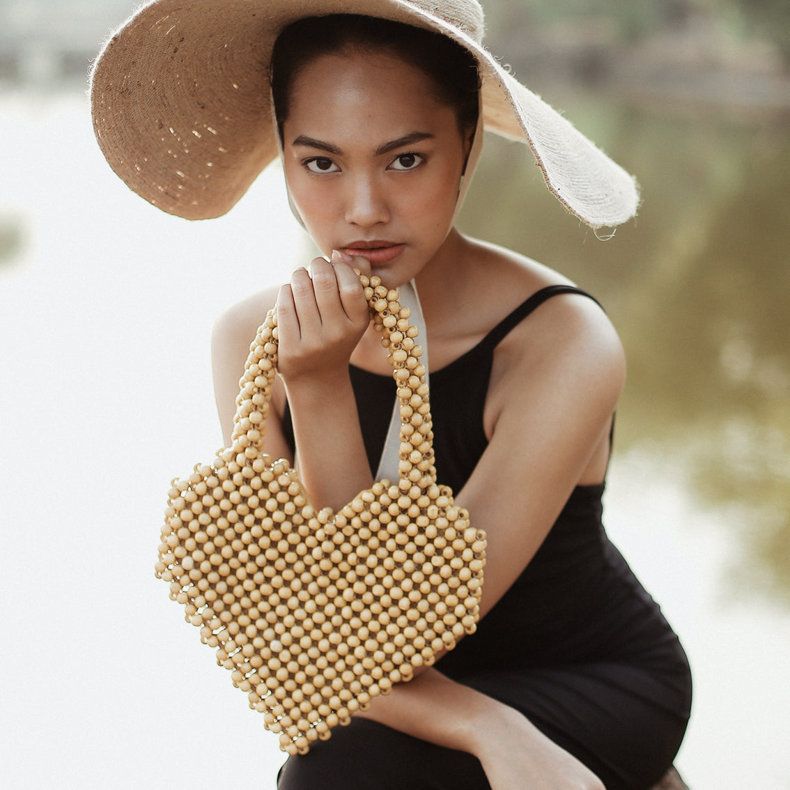 Hati Heart Wood-Beaded Tote Bag - Premium Tote Bag from BrunnaCo - Just $115! Shop now at Ida Louise Boutique