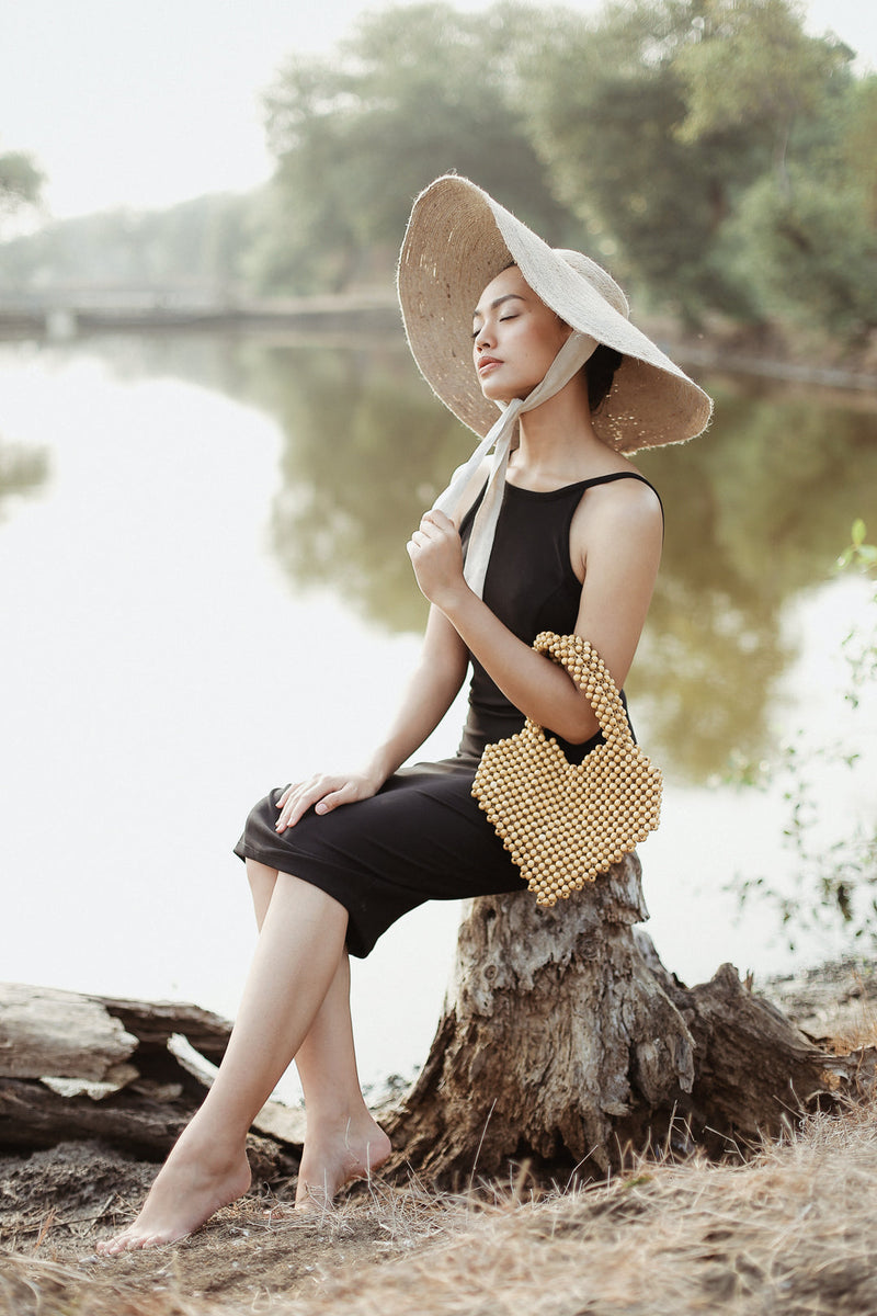 Hati Heart Wood-Beaded Tote Bag - Premium Tote Bag from BrunnaCo - Just $115! Shop now at Ida Louise Boutique