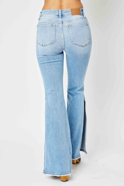 Judy Blue Mid Rise Slit Flare Jeans - Premium Jeans from Trendsi - Just $74! Shop now at Ida Louise Boutique